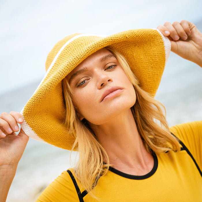 Bloom Line Handmade Crochet hat in Butter Yellow: Soft and shapeable crochet hat inspired by the classic Calla Lily flower shape. Meticulously made by artisans in the villages of Bali. Its light and semi-floppy construction make it the perfect hat for picnics at the beach or poolside any season of the year.