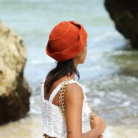 Gani Sailor Crochet hat in Roobois Tea Brown is hand-crocheted in breathable cotton yarn by our local artisans in Java island. Featuring a modern twist of the cloche hat shape, this hat has&nbsp;sturdy textures and fluid proportions.