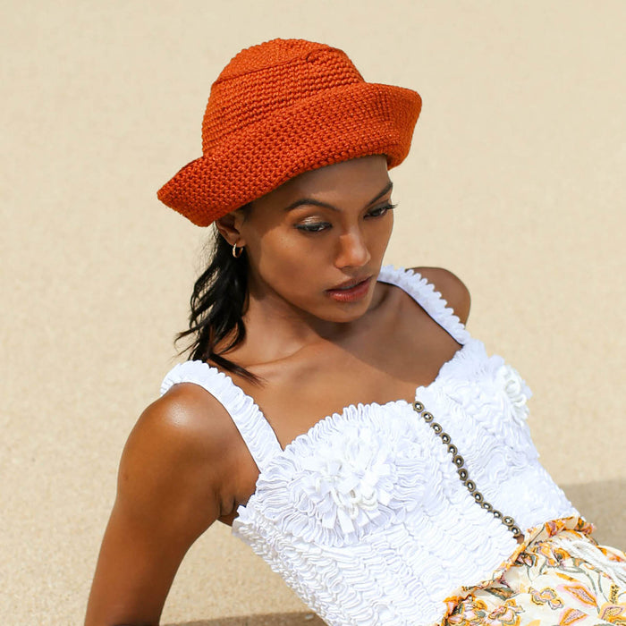 Gani Sailor Crochet hat in Roobois Tea Brown is hand-crocheted in breathable cotton yarn by our local artisans in Java island. Featuring a modern twist of the cloche hat shape, this hat has&nbsp;sturdy textures and fluid proportions.
