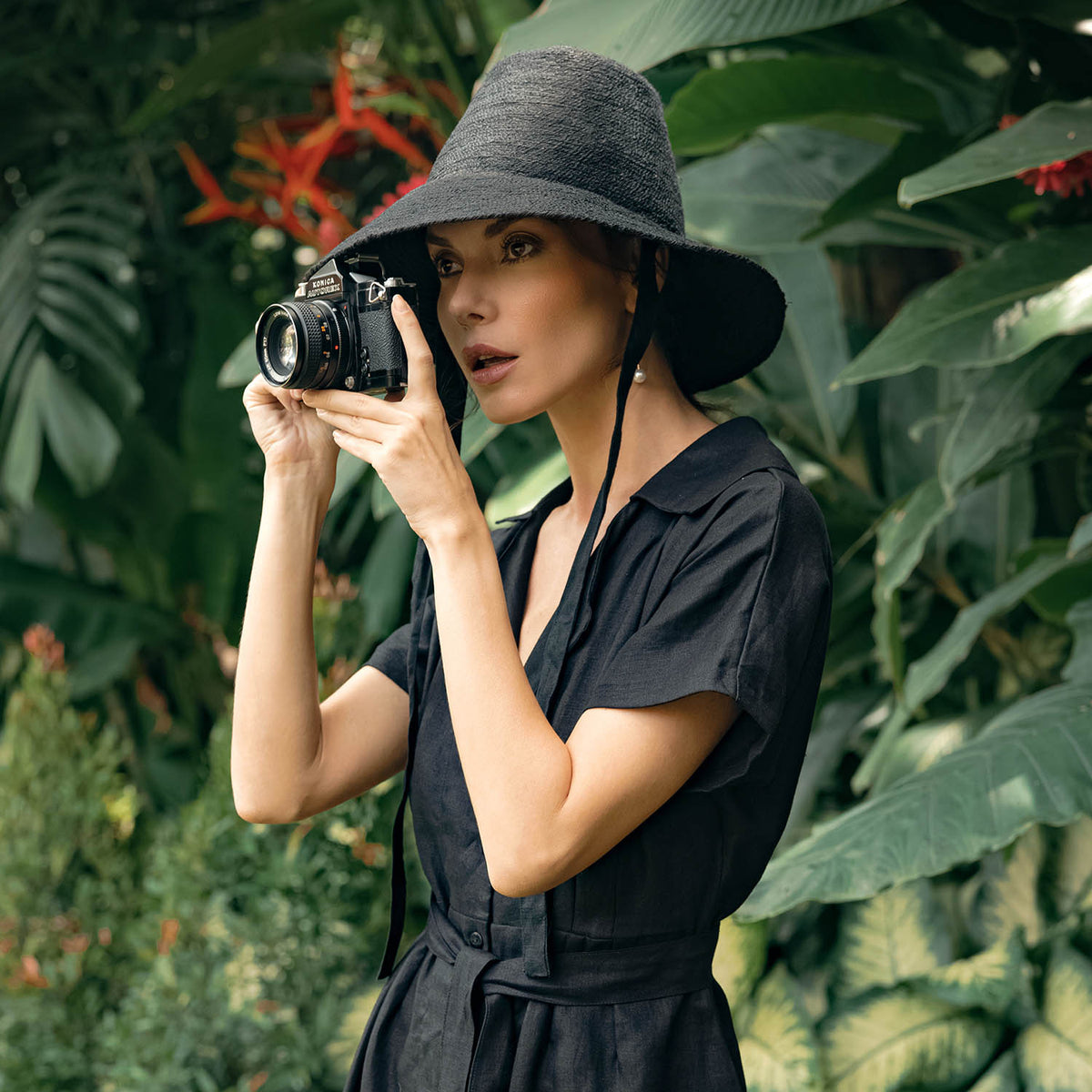 Meg Jute hat Beach Sun Hat in Black. Beautifully crafted with a tall crown shape and medium-width brim to bring back the effortless classic charm. Take this hat to your next tropical adventure or simply style up your daily grocery shop trips!