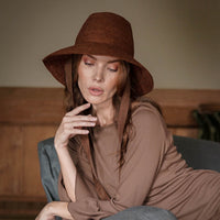 Meg Jute Straw Beach Hat in Burnt Sienna. Beautifully crafted with a tall crown shape and medium-width brim to bring back the effortless classic charm. Take this hat to your next outdoor adventure or simply style up your daily grocery shop trips!