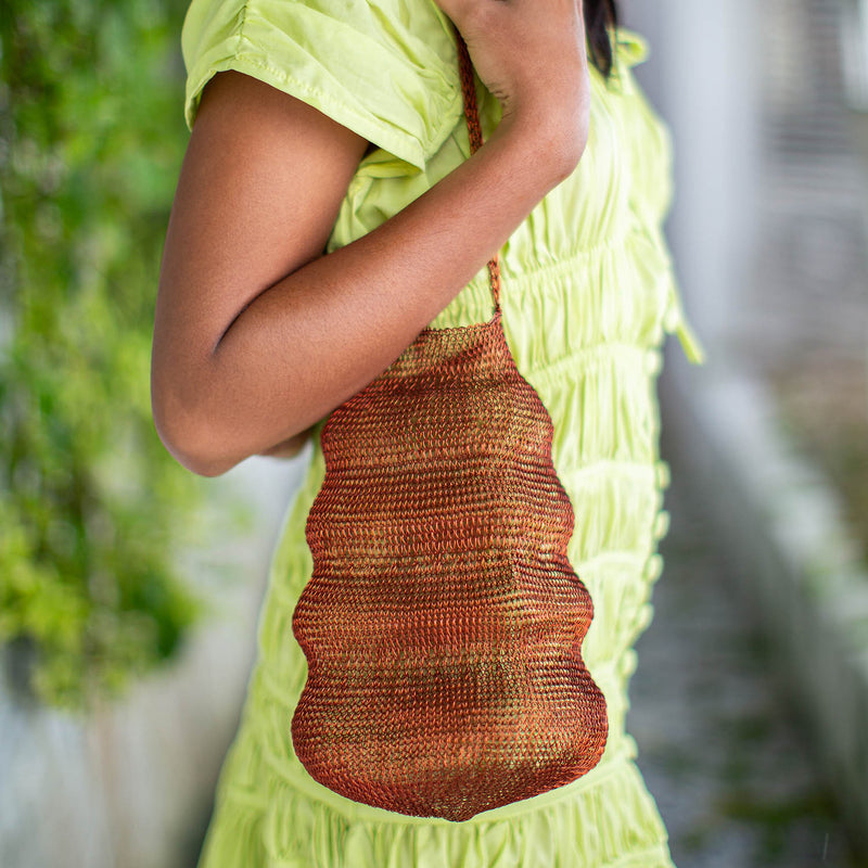 Sustainable Circularity Eco Friendly Artisanal Red Copper Wire Tote Bag for Beach, Vacation and Summer Pool Party. Handmade by wire artist in Bali.