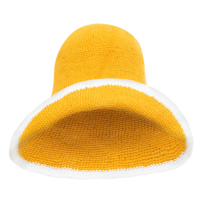 Bloom Line Handmade Crochet hat in Butter Yellow: Soft and shapeable crochet hat inspired by the classic Calla Lily flower shape. Meticulously made by artisans in the villages of Bali. Its light and semi-floppy construction make it the perfect hat for picnics at the beach or poolside any season of the year.
