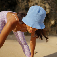 Florette Crochet Beach Bucket Hat in Periwinkle Blue. Soft and shapeable crochet bucket hat meticulously made by artisans in the villages of Bali. This hat feels airy for summer days and offers irreplaceable comfort at any season of the year.
