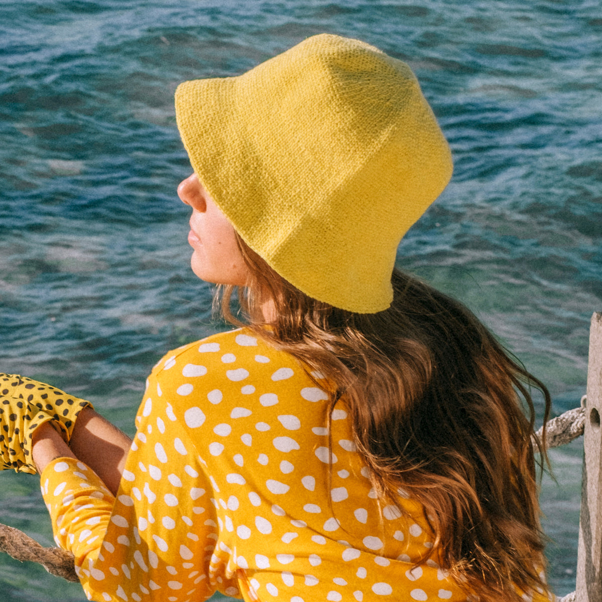 Florette Knitted Crochet Beanie Hat in Yellow. Handmade crochet hat made by artisans in Bali perfect for summer days