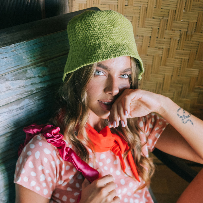 Florette Crochet Bucket Clochet hat in Lime Green. Soft and shapeable crochet bucket hat meticulously made by artisans in the villages of Bali. This hat feels airy for summer days and offers irreplaceable comfort at any season of the year.