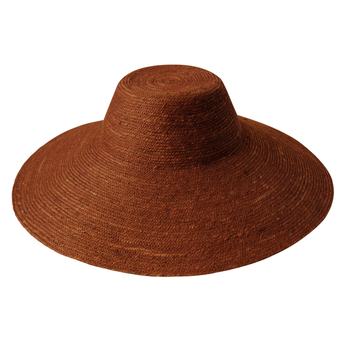 Don't be afraid of the sun. Step out in confidence with this ultra-comfortable Riri Jute woven sun hat in burnt Sienna color. Take this artisanal hat everywhere from the sunny beachside to the hot savanna of your choice and enjoy full-on protection under the sun, while still keeping in style. This sustainable resort vacation straw hat is uniquely made by artisans in Bali.