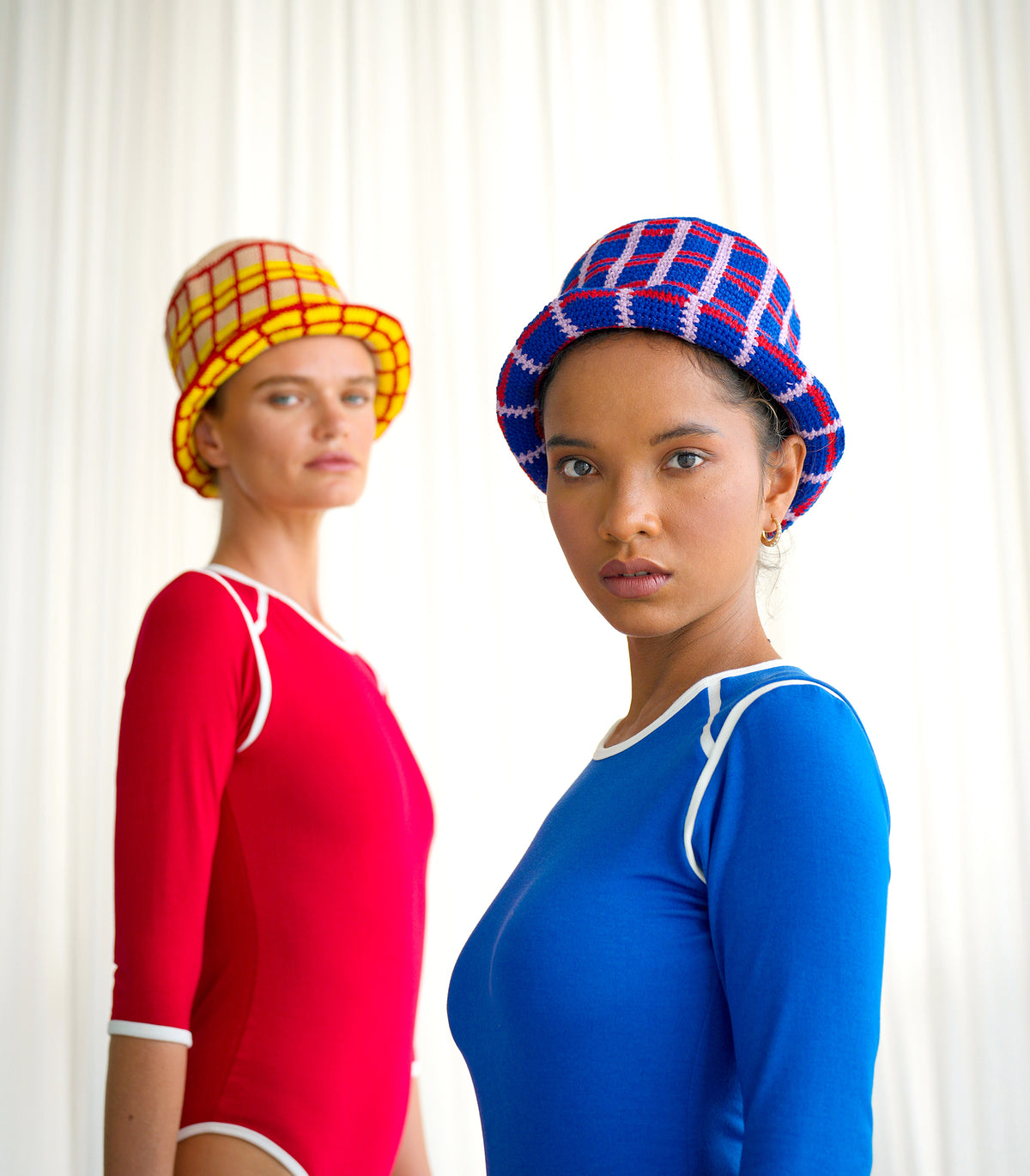 Schoolgirl Plaid Crochet Hat. Hand-crocheted by female artisans in Java, Indonesia, this SCHOOLGIRL plaid crochet hat is a reminder of the beautiful feeling of being outdoors. Its fresh hot red and calming beige color invites us to celebrate the seasons in the sun.