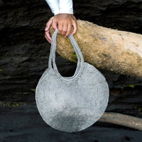 Sol Wire bag in Silver. Precious handwoven tote bag made from stainless metal wire in silver color. Made carefully by our artisans in remote villages in Bali, who create the bags from their very own homes. It is a true masterpiece.