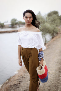 BrunnaCo Sayan Raffia Woven Straw Tote Bag in Red and Blue. A raffia beach tote that is perfect for any beach stroll or a casual walk to the nearest farmer's market